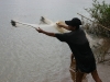 Fishing net with weights